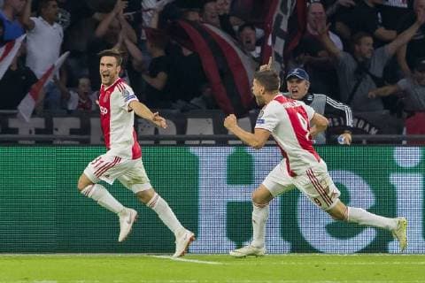 AMSTERDAM, Johan Cruijff Arena, 19-09-2018 , season 2018 2019 , UEFA Champions League. Ajax player Nico Tagliafico (l) celebrating the goal scored 1-0 with Ajax player Klaas Jan Huntelaar (r) during the match Ajax - AEK Athens Ajax - AEK Athens  x2476721x