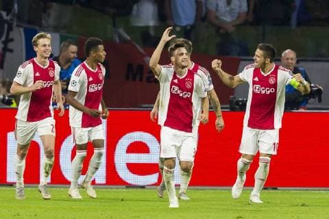 AMSTERDAM, Johan Cruijff Arena, 19-09-2018 , season 2018 2019 , UEFA Champions League. Ajax player Nico Tagliafico (2R) with Ajax player Frenkie de Jong, Ajax player David Neres and Ajax player Dusan Tadic during the match Ajax - AEK Athens Ajax - AEK Athens  x2476724x