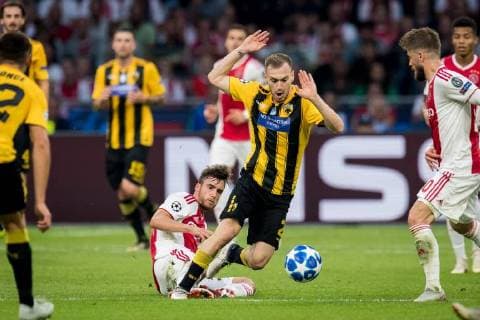(L-R) Nico Tagliafico of Ajax, Michalis Bakakis of AEK Athens during the UEFA Champions League group E match between Ajax Amsterdam and AEK FC at the Johan Cruijff Arena on September 19, 2018 in Amsterdam, The Netherlands UEFA Champions League 2018 2019 xVIxVIxImagesx xRonaldxBonestrooxIVx 12172800
