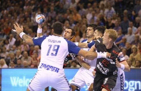 Photo no getting through for Rasmus Lauge Flensburg against Susnja and right behind Srsen Handball Men 1 Bundesliga on Wed 19 09 2018 Flensburg HC Zagreb