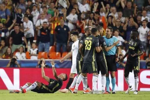 VALENCIA, 19-09-2018, Stadium Mestalla, season 2018 2019, Champions League football. Juventus player Cristiano Ronaldo gets a red card from Felix Brych (GER) and is sent off the pitch during the match Valencia CF - Juventus Valencia - Juventus  x2477294x