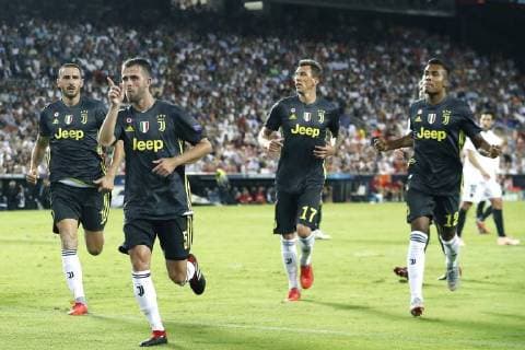Sport Bilder des Tages VALENCIA, 19-09-2018, Stadium Mestalla, season 2018 2019, Champions League football. Juventus player Miralem Pjanic scores 0-2 during the match Valencia CF - Juventus Valencia - Juventus  x2477431x