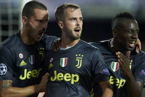BARCELONA, 19-09-2018. Champions League 2018 2019, date 1. Valencia-Juventus. MIralem Pjanic of Juventus celebrates his goal with his teammates during the game Valencia - Juventus Valencia - Juventus  x2477530x