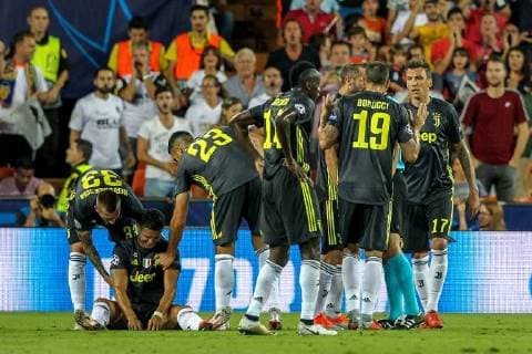 19th September 2018, Mestalla, Valencia, Spain; UEFA Champions League football, Valencia versus Juventus; Cristiano Ronaldo of Juventus Turin sits on the pitch after being shown a red card for a foul and sent off  ActionPlus12063904 PedroxSalado