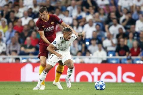 (L-R) Edin Dzeko of AS Roma, Mariano Diaz of Real Madrid during the UEFA Champions League group G match between Real Madrid and AS Roma at the Santiago Bernabeu stadium on September 19, 2018 in Madrid, Spain UEFA Champions League 2018 2019 xVIxVIxImagesx xMauricexvanxSteenxIVx 12174785