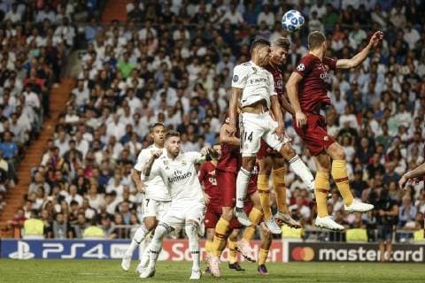 19th September 2018, Santiago Bernabeu, Madrid, Spain; UEFA Champions League football, Real Madrid versus AS Roma; Carlos Enrique Casemiro (Real Madrid) fights for the header  ActionPlus12063948 ShotxforxPress