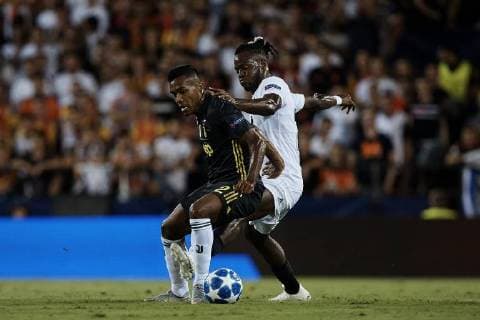 September 19, 2018 - Valencia, Valencia, Spain - Alex Sandro Lobo Silva (L) of Juventus competes for the ball with Michy Batshuayi of Valencia CF during the UEFA Champions League group H match between Valencia CF and Juventus at Mestalla on September 19, 2018 in Valencia, Spain Valencia v Juventus - UEFA Champions League  - ZUMAn230 20180919_zaa_n230_192 Copyright: xDavidxAliagax