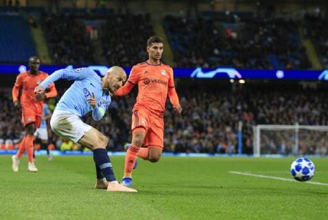 19th September 2018, Etihad Stadium, Manchester, England; UEFA Champions League football, Manchester City versus Lyon; David Silva of Manchester City crosses the ball into the Lyon box  ActionPlus12063955 ConorxMolloy