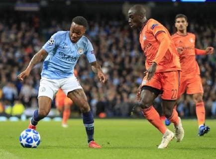 19th September 2018, Etihad Stadium, Manchester, England; UEFA Champions League football, Manchester City versus Lyon; Raheem Sterling of Manchester City is covered by Ferland Mendy of Lyon  ActionPlus12063963 ConorxMolloy