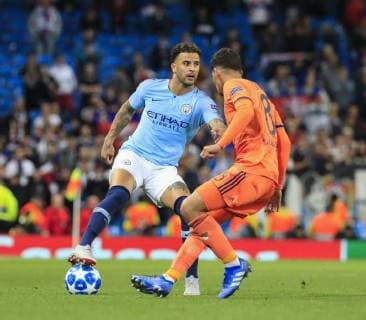 19th September 2018, Etihad Stadium, Manchester, England; UEFA Champions League football, Manchester City versus Lyon; Kyle Walker of Manchester City looks to find a way around Houssem Aouar of Lyon  ActionPlus12063967 ConorxMolloy