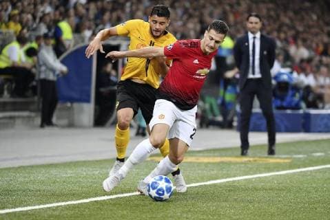 19 09 2018 Bern Switzerland Stade de Suisse Football Mens Champions League Season 2018 2019 BSC Young Boys Manchester United Pictured 20 Diogo Dalot Manchester 23 Loris Benito YB action duel