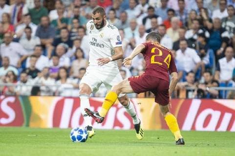 September 19, 2018 - Madrid, Spain - Real Madrid Karim Benzema and A.S.Roma Alessandro Florenzi during UEFA Champions League match between Real Madrid and A.S.Roma at Santiago Bernabeu Stadium in Madrid, Spain. September 19, 2018. Real Madrid v AS Roma - UEFA Champions League Group G  - ZUMAn230 20180919_zaa_n230_256 Copyright: xCoolmediax