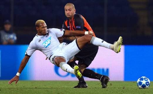 19.09.2018 Kharkiv(Ukraine) FC Shakhtar Donetsk-TSG 1899 Hoffenheim champions league men s football Joelinton(L)TSG 1899 Hoffenheim, Yaroslav Rakitskiy(R) FC Shakhtar :Str 