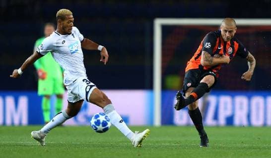 19.09.2018 Kharkiv(Ukraine) FC Shakhtar Donetsk-TSG 1899 Hoffenheim champions league men s football Joelinton(L)TSG 1899 Hoffenheim, Yaroslav Rakitskiy(R) FC Shakhtar :Str 