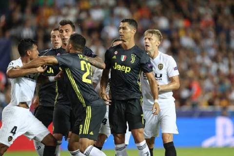 September 19, 2018 - Valencia, Spain - Cristiano Ronaldo of Juventus FC argues with Medhi Benatia of Valencia CF during the UEFA Champions League, Group H football match between Valencia CF and Juventus FC on September 19, 2018 at Mestalla stadium in Valencia, Spain Football - UEFA Champions League - Valencia CF vs Juventus FC  - ZUMAb169 20180919_zaa_b169_001 Copyright: xManuelxBlondeau Aop.Pressx