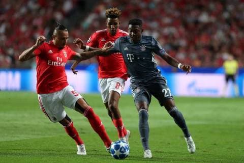 September 19, 2018 - Lisbon, Portugal - Benfica s Serbian midfielder Ljubomir Fejsa (L) vies with Bayern Munich s defender David Alaba from Austria during the UEFA Champions League Group E football match SL Benfica vs Bayern Munich at the Luz stadium in Lisbon, Portugal on September 19, 2018. UEFA Champions League Group E football match SL Benfica vs Bayern Munich - ZUMAf123 20180919_zap_f123_013 Copyright: xPedroxFiuzax