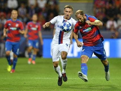 Fyodor Chalov of CSKA, left, and Roman Hubnik of Viktoria in action during the 1st round, Group G, Champions League match FC Viktoria Plzen vs CSKA Moscow in Pilsen, Czech Republic, on September 19, 2018. (CTKxPhoto MichalxKamaryt) CTKPhotoP201809191025901  _KMT0465