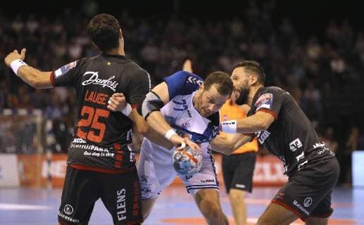 Photo on the ball Damir Bicancic against Tobias Karlsson Flensburg Handball men 1 Bundesliga on Wed 19 09 2018 Flensburg HC Zagreb