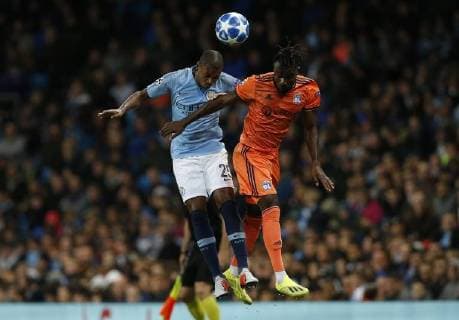 Manchester City s Fernandinho (L) battles for the ball with Lyon s Maxwel Cornet during the UEFA Champions League Group F match at the Etihad Stadium, Manchester. Picture date 19th September 2018. Picture credit should read: Andrew Yates Sportimage EDITORIAL USE ONLY. No use with unauthorised audio, video, data, fixture lists, club league logos or live services. Online in-match use limited to 120 images, no video emulation. No use in betting, games or single club league player publications.