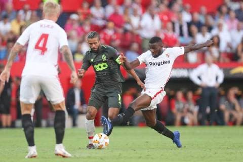 Standard s captain Mehdi Carcela and Sevilla s midfielderIbrahim Amadou fight for the ball during a match between Belgian soccer team Standard de Liege and Spanish club Sevilla FC, Thursday 20 September 2018 in Sevilla, Spain, on day one of the UEFA Europa League group stage. BRUNOxFAHY  x05430077x