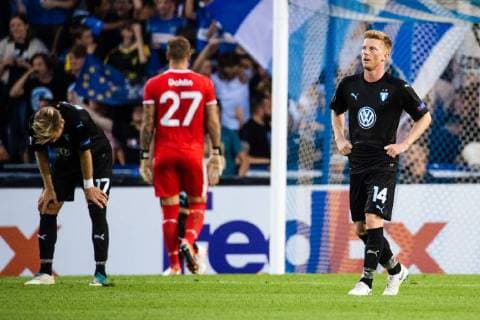 180920 Rasmus Bengtsson and Anders Christiansen of Malmö FF looks dejected after Leandro Trossard or Genk not pictured scored 1 0 during the Europe League group stage match between Genk and Malmö FF on September 20, 2018 in Genk Photo Ludvig Thunman BILDBYRAN code LT 35538  Copyright: LUDVIGxTHUNMAN BB180920LT040