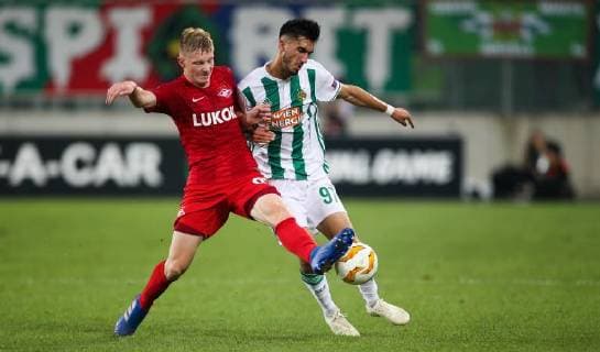 SOCCER - EL, Rapid vs Spartak VIENNA,AUSTRIA,20.SEP.18 - SOCCER - UEFA Europa League, group stage, SK Rapid Wien vs Spartak Moscow. Image shows Nikolay Rasskazov (Spartak) and Andrei Ivan (Rapid). Keywords: Wien Energie. GEPAxpictures xPhilippxBrem