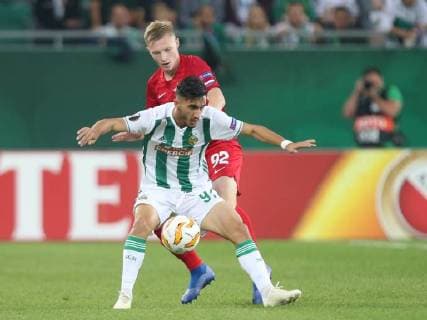SOCCER - EL, Rapid vs Spartak VIENNA,AUSTRIA,20.SEP.18 - SOCCER - UEFA Europa League, group stage, SK Rapid Wien vs Spartak Moscow. Image shows Andrei Ivan (Rapid) and Nikolai Rasskazov (Spartak). GEPAxpictures xPatrickxLeuk