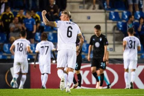 180920 Sebastien Dewaest of Genk crelebrates while Andreas Vindheim of Malmö FF looks dejected after 2 0 during the Europe League group stage match between Genk and Malmö FF on September 20, 2018 in Genk Photo Ludvig Thunman BILDBYRAN code LT 35538  Copyright: LUDVIGxTHUNMAN BB180920LT069
