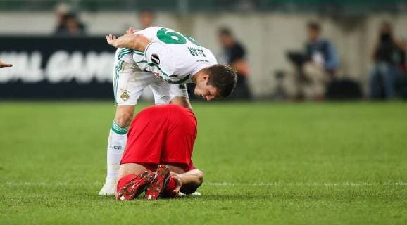 SOCCER - EL, Rapid vs Spartak VIENNA,AUSTRIA,20.SEP.18 - SOCCER - UEFA Europa League, group stage, SK Rapid Wien vs Spartak Moscow. Image shows Deni Alar (Rapid) and Georgiy Dzhikiya (Spartak). GEPAxpictures xPhilippxBrem