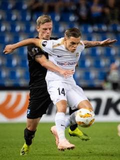 180920 Sören Rieks of Malmö FF and Leandro Trossard of Genk competes for the ball during the Europa League group stage match between Genk and Malmö FF on September 20, 2018 in Genk Photo Ludvig Thunman BILDBYRAN Code LT 35538  Copyright: LUDVIGxTHUNMAN BB180920LT075