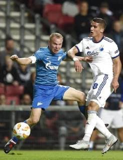 Aleksandr Anyukov og Pieros Sotiriou. Europa League kamp mellem FCK-FC Zenit i Teliaparken torsdag den 20 september 2018. , Copenhagen Denmark  Copyright: LiselottexSabroex cop101 spdk20180920-214040-L