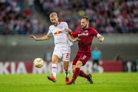 Goalkeeper Marius Mueller 1 of RB Leipzig in a duel with defender Andreas Ulmer 17 of FC RB Salzburg during the meeting in the UEFA Europa League between RB Leipzig and FC Red Bull Salzburg in the Red Bull Arena on 20 September 2018 in Leipzig Saxony Germany FB EL RB Leipzig FC Red Bull Salzburg Copyright: xEIBNER HartmutxBoesenerx EP_HBR