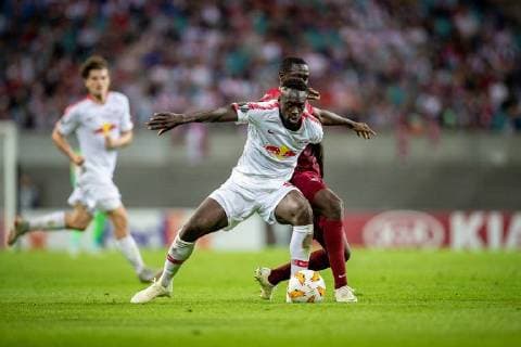 Attacking player Jean Kevin Augustin 29 of RB Leipzig in a duel with midfielder Diadie Samassekou 8 of FC RB Salzburg during the meeting in the UEFA Europa League between RB Leipzig and FC Red Bull Salzburg in the Red Bull Arena on 20 September 2018 in Leipzig Saxony Germany FB EL RB Leipzig FC Red Bull Salzburg Copyright: xEIBNER HartmutxBoesenerx EP_HBR
