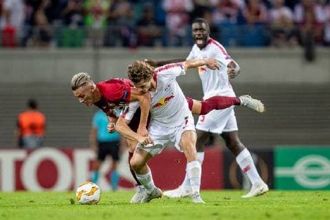 Midfielder Marcel Sabitzer 7 of RB Leipzig in a duel with Sturm player Hannes Wolf 13 of FC RB Salzburg during the meeting in the UEFA Europa League between RB Leipzig and FC Red Bull Salzburg in the Red Bull Arena on 20 September 2018 in Leipzig Saxony Germany FB EL RB Leipzig FC Red Bull Salzburg Copyright: xEIBNER HartmutxBoesenerx EP_HBR