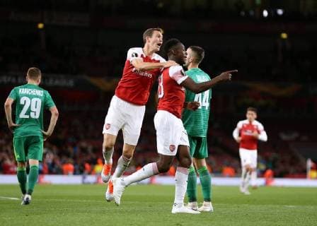 & xa7;20th September 2018, Emirates Stadium, London, England; UEFA Europa League football, Arsenal versus Vorskla Poltava; Danny Welbeck of Arsenal celebrates with Stephan Lichtsteiner of Arsenal after scoring his sides 2nd goal from a header in the 48th minute to make it 2-0  ActionPlus12064068 JohnxPatrickxFletcher