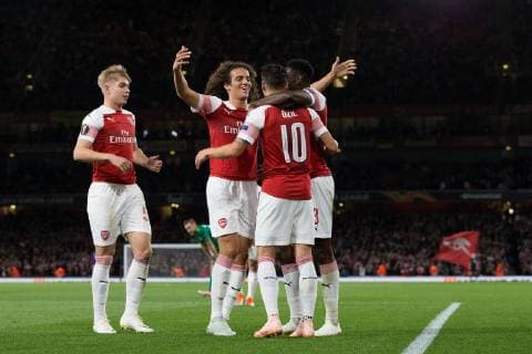 Mesut Ozil of Arsenal celebrates scoring his side s fourth goal with team-mates during the UEFA Europa League Group E match at the Emirates Stadium, London. Picture date 20th September 2018. Picture credit should read: Craig Mercer Sportimage EDITORIAL USE ONLY. No use with unauthorised audio, video, data, fixture lists, club league logos or live services. Online in-match use limited to 120 images, no video emulation. No use in betting, games or single club league player publications.