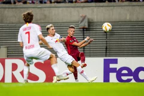 Sturm player Hannes Wolf 13 of FC RB Salzburg in a duel with midfielder Kevin Kampl 44 of RB Leipzig during the meeting in the UEFA Europa League between RB Leipzig and FC Red Bull Salzburg in the Red Bull Arena on 20 September 2018 in Leipzig Saxony Germany FB EL RB Leipzig FC Red Bull Salzburg Copyright: xEIBNER HartmutxBoesenerx EP_HBR