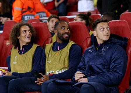 & xa7;20th September 2018, Emirates Stadium, London, England; UEFA Europa League football, Arsenal versus Vorskla Poltava; Matteo Guendouzi, Alexandre Lacazette of Arsenal and Mesut Ozil of Arsenal look on from the technical area  ActionPlus12064089 JohnxPatrickxFletcher