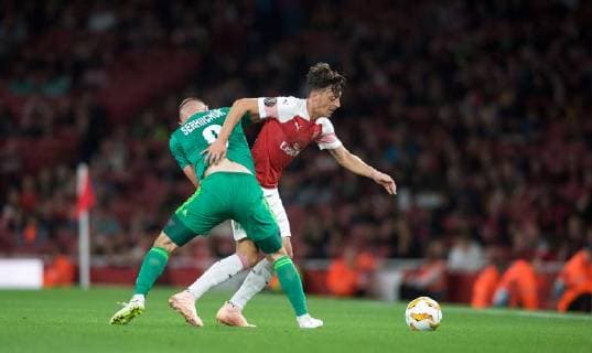Mesut ?zil of Arsenal & Mykhaylo Serhiychuk of Vorskla Poltava during the UEFA Europa League match group between Arsenal and Vorskla Poltava at the Emirates Stadium, London, England on 20 September 2018. Copyright: xAAx PMI-2243-0094