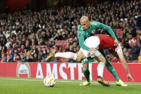 Nicolas Careca of Vorskla tries to evade Sokratis Papastathopoulos of Arsenal during the UEFA Europa League Group Stage match between Arsenal FC and FC Vorskla Poltava at the Emirates Stadium, London, England on 20 September 2018. Copyright: xCarltonxMyriex 21100087