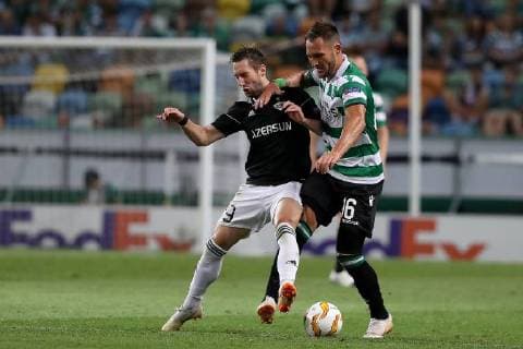 September 20, 2018 - Lisbon, Portugal - Sporting s midfielder Nemanja Gudelj from Serbia (R ) vies with Qarabag s midfielder Filip Ozobic during the UEFA Europa League Group E football match Sporting CP vs Qarabag at Alvalade stadium in Lisbon, on September 20, 2018. Sporting CP v Qarabag FK - UEFA Europa League - Group E  - ZUMAn230 20180920_zaa_n230_367 Copyright: xPedroxFiuzax