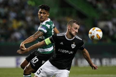 September 20, 2018 - Lisbon, Portugal - Maksim Medvedev of Qarabag FK (R) vies for the ball with Fredy Montero of Sporting (L) during Europa League 2018 19 match between Sporting CP vs Qarabagh FK, in Lisbon, on September 20, 2018. Sporting CP v Qarabag FK - UEFA Europa League - Group E  - ZUMAn230 20180920_zaa_n230_325 Copyright: xCarlosxPalmax