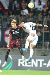 Bryan Melisse F91 Dudelange 27 in header duel with Samu Castillejo AC Milan 7 in Europa League match between F 91 Dudelange Luxembourg and AC Milan Italy on 20 09 18 F 91 Dudelange Luxembourg vs AC Milan Italy Europa League Luxembourg Copyright: xEIBNER PeterxFranzx EP_PFZ