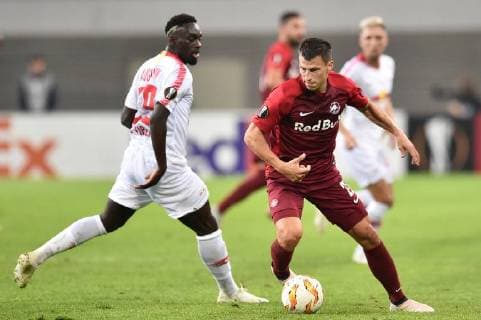 Football Europe League Group Stage 1 Gameday RB Leipzig FC Salzburg on 20 09 2018 in the Red Bull Arena in Leipzig Stefan Lainer Salzburg forward Jean Kevin Augustin Leipzig back DFL Regulations prohibit any use of images as image sequences and or quasi video xTTx