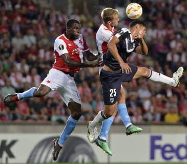 L-R Michael Ngadeu and Tomas Soucek of Slavia and Pablo Nascimento Castro of Bordeaux in action during the 1st round, Group C, UEFA Europa League match SK Slavia Praha vs Girondins Bordeaux in Prague, Czech Republic, on September 20, 2018 . (CTKxPhoto MichaelaxRihova) CTKPhotoP201809201116001  mir 5