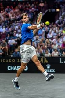 CHICAGO, IL - SEPTEMBER 21: Team Europe Grigor Dimitrov of of Bulgaria returns a shot against Team World Frances Tiafoe of the United States during their Men s Singles match on day one of the 2018 Laver Cup at the United Center on September 21, 2018 in Chicago, Illinois. (Photo by Robin Alam Icon Sportswire) TENNIS: SEP 21 Laver Cup Icon164180921109 EDITORIAL USE ONLY