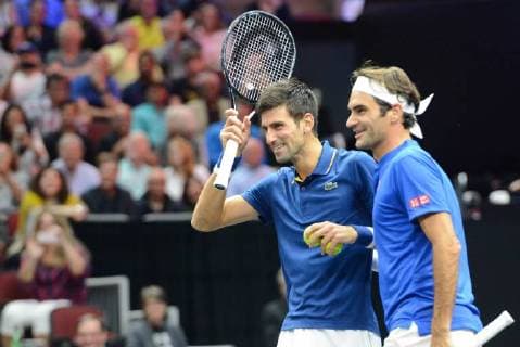 September 21, 2018 - Chicago, Illinois, United States - ROGER FEDERER and NOVAK DJOKOVIC in doubles action in the 2018 Laver Cup tennis event in Chicago. Tennis 2018: Laver Cup - ZUMAl132 20180921_zap_l132_018 Copyright: xChristopherxLevyx