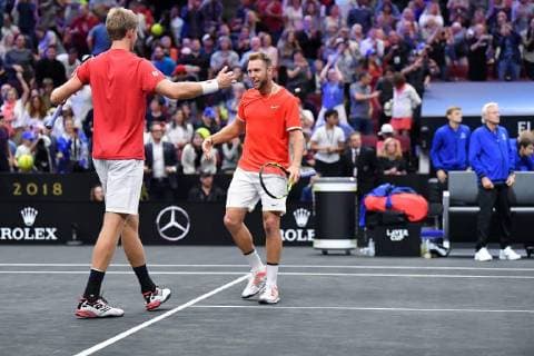 CHICAGO, IL - SEPTEMBER 21: Team World Jack Sock of the United States celebrates with Team World Kevin Anderson of South Africa after defeating Team Europe Novak Djokovic of Serbia Team Europe Roger Federer of Switzerland in their Men s Doubles match on day one of the 2018 Laver Cup at the United Center on September 21, 2018 in Chicago, Illinois. (Photo by Robin Alam Icon Sportswire) TENNIS: SEP 21 Laver Cup Icon164180921121 EDITORIAL USE ONLY