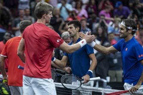 September 22, 2018 - Chicago, Illinois, U.S - Team World member KEVIN ANDERSON of South Africa and partner JACK SOCK of the United States shake hands after defeating Team Europe members ROGER FEDERER of Switzerland and partner GRIGOR DIMITROV of Bulgaria after the first doubles match on Day One of the Laver Cup at the United Center in Chicago, Illinois. Laver Cup Day 1 - ZUMAl140 20180922_zap_l140_003 Copyright: xShelleyxLiptonx
