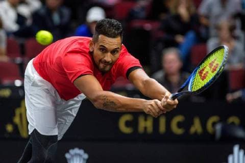 CHICAGO, IL - SEPTEMBER 22: Team World s Nick Kyrgios of Australia returns a ball to Team Europe s Roger Federer of Switzerland during a singles match on day two of the 2018 Laver Cup on September 22, 2018, at the United Center in Chicago, Illinois. Federer beats Kyrgios 6-3 6-2. (Photo by Daniel Bartel Icon Sportswire) TENNIS: SEP 22 Laver Cup Icon180922022 EDITORIAL USE ONLY
